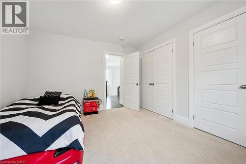 Soft neutral carpeting paired with light gray walls - 72 Elmbank Trail, Kitchener, ON - Indoor Photo Showing Bedroom