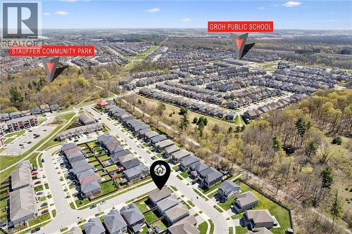 Aerial perspective showcasing a residential neighborhood with tree-lined streets - 72 Elmbank Trail, Kitchener, ON - Outdoor With View