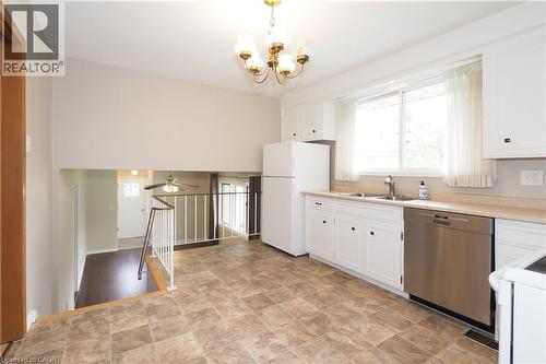 Spacious kitchen overlooking family room on lower level - 76 Cloverdale Crescent, Kitchener, ON - Indoor Photo Showing Kitchen