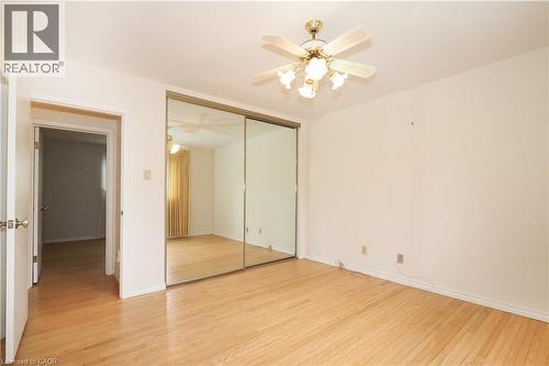 Bedroom with full height/width mirrored closet doors - 76 Cloverdale Crescent, Kitchener, ON - Indoor Photo Showing Other Room