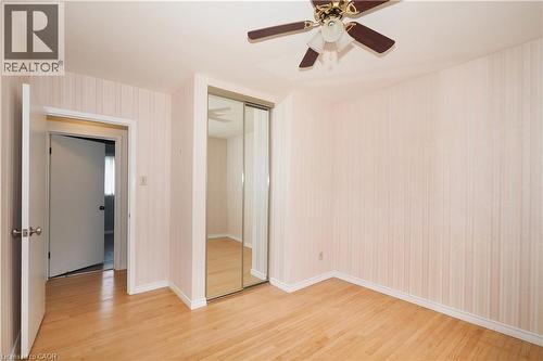 Bedroom featuring full height/width mirrored closet doors - 76 Cloverdale Crescent, Kitchener, ON - Indoor Photo Showing Other Room