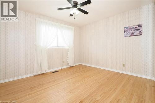 bedroom view highlighting refinished hardwood flooring - 76 Cloverdale Crescent, Kitchener, ON - Indoor Photo Showing Other Room