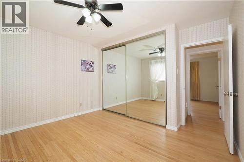 Bedroom with full height & width closet doors - 76 Cloverdale Crescent, Kitchener, ON - Indoor Photo Showing Other Room