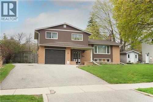 Front of home with paved double wide driveway - 76 Cloverdale Crescent, Kitchener, ON - Outdoor With Facade