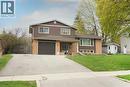 Front of home with paved double wide driveway - 76 Cloverdale Crescent, Kitchener, ON  - Outdoor With Facade 
