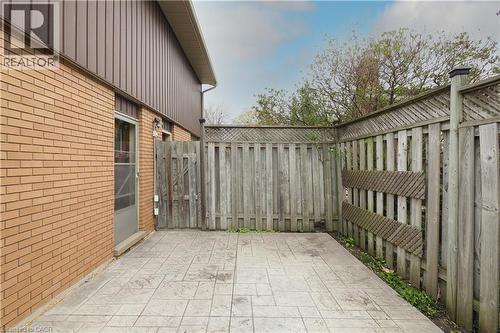 Side entrance area to backyard - 76 Cloverdale Crescent, Kitchener, ON - Outdoor With Exterior
