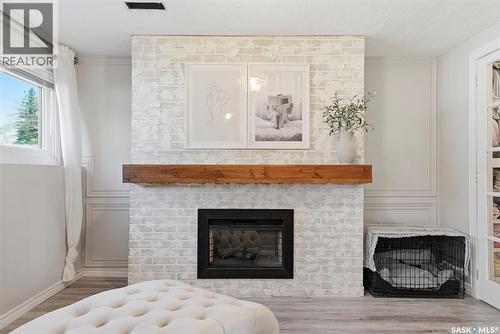 148 Maclean Crescent, Saskatoon, SK - Indoor Photo Showing Living Room With Fireplace