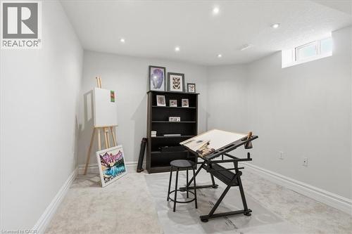 Lower level room featuring recessed lighting, a high window, light-colored carpet flooring, white painted walls, and white baseboards - 19 Forestview Drive, Cambridge, ON - Indoor