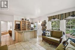 sun room with fully equipped wet bar - 