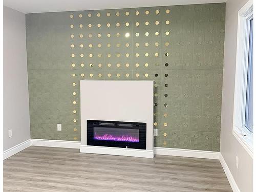 310 Dewe Avenue, Thunder Bay, ON - Indoor Photo Showing Other Room With Fireplace