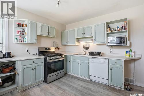 1011 1St Street E, Saskatoon, SK - Indoor Photo Showing Kitchen With Double Sink