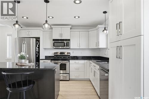 107 Langlois Way, Saskatoon, SK - Indoor Photo Showing Kitchen With Stainless Steel Kitchen With Upgraded Kitchen