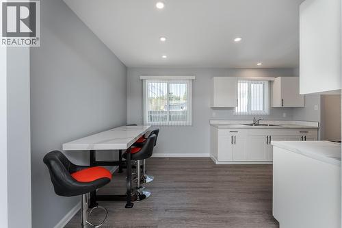 7759 Queens Crescent, Prince George, BC - Indoor Photo Showing Kitchen With Double Sink
