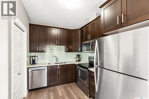 37 510 Kloppenburg Crescent, Saskatoon, SK - Indoor Photo Showing Kitchen With Double Sink