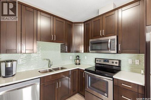37 510 Kloppenburg Crescent, Saskatoon, SK - Indoor Photo Showing Kitchen With Double Sink With Upgraded Kitchen