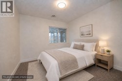 Spare Bedroom *This photo has been virtually staged - 