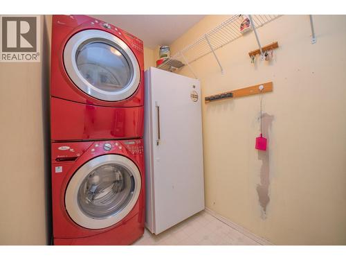 Laundry room off entry, stand up freezer included - 3929 22 Avenue Unit# 309, Vernon, BC - Indoor Photo Showing Laundry Room