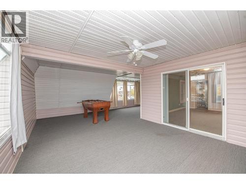 Enclosed patio/deck for games room, extra space for entertaining guests - 3929 22 Avenue Unit# 309, Vernon, BC - Outdoor With Exterior