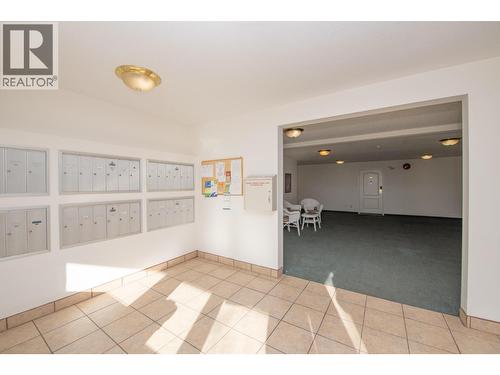 Entrance with Mail Boxes - 3929 22 Avenue Unit# 309, Vernon, BC - Indoor Photo Showing Other Room