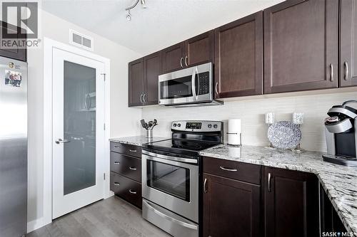 8849 Kestral Drive, Regina, SK - Indoor Photo Showing Kitchen With Upgraded Kitchen