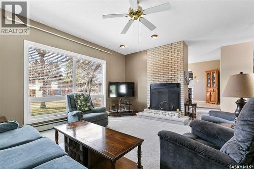 116 Stuart Street, Cupar, SK - Indoor Photo Showing Living Room With Fireplace