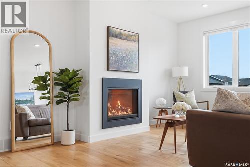 330 Hamm Way, Saskatoon, SK - Indoor Photo Showing Living Room With Fireplace