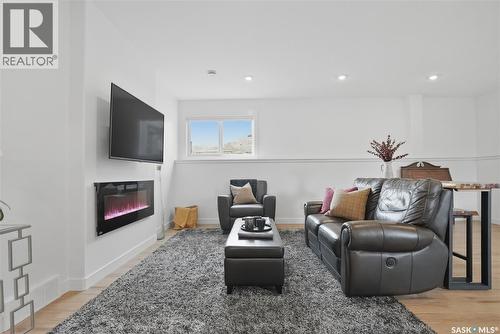 330 Hamm Way, Saskatoon, SK - Indoor Photo Showing Other Room With Fireplace