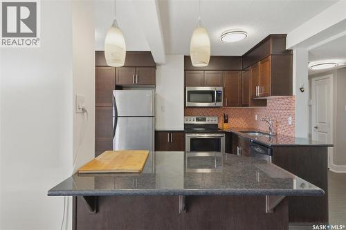 1005 320 5Th Avenue N, Saskatoon, SK - Indoor Photo Showing Kitchen With Stainless Steel Kitchen With Upgraded Kitchen