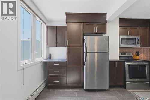 1005 320 5Th Avenue N, Saskatoon, SK - Indoor Photo Showing Kitchen With Stainless Steel Kitchen