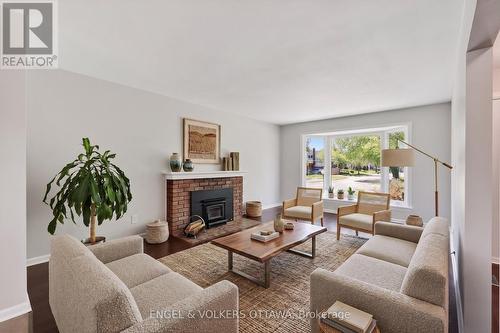 Photo has been virtually staged - 989 Connaught Avenue, Ottawa, ON - Indoor Photo Showing Living Room With Fireplace