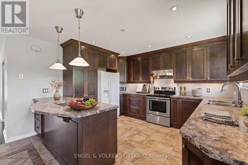 Photo has been virtually staged - 989 Connaught Avenue, Ottawa, ON - Indoor Photo Showing Kitchen With Stainless Steel Kitchen With Double Sink