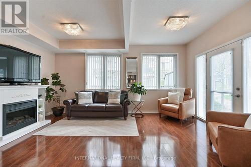 111 - 3075 Thomas Street, Mississauga, ON - Indoor Photo Showing Living Room With Fireplace