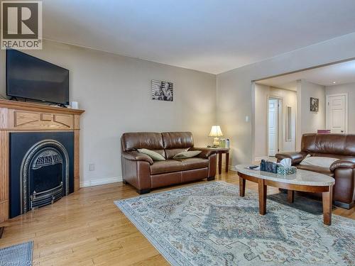 259 Scott Street Unit# 7, St. Catharines, ON - Indoor Photo Showing Living Room With Fireplace