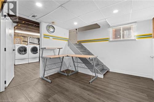 Finished basement space featuring wood-finish flooring, recessed lighting, and a drop ceiling - 204 Beach Boulevard, Hamilton, ON - Indoor