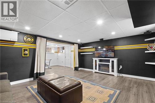 Finished living space featuring wood-finish flooring and recessed ceiling lighting - 204 Beach Boulevard, Hamilton, ON - Indoor
