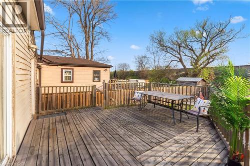 Expansive wood-finish deck with perimeter railing and a small built-in shed - 204 Beach Boulevard, Hamilton, ON - Outdoor With Deck Patio Veranda With Exterior