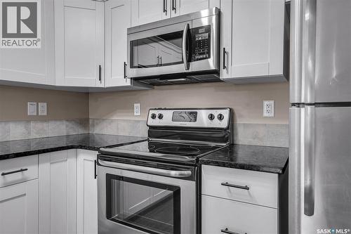 128 125 Willis Crescent, Saskatoon, SK - Indoor Photo Showing Kitchen With Stainless Steel Kitchen