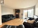 101 335 Kingsmere Boulevard, Saskatoon, SK  - Indoor Photo Showing Living Room With Fireplace 
