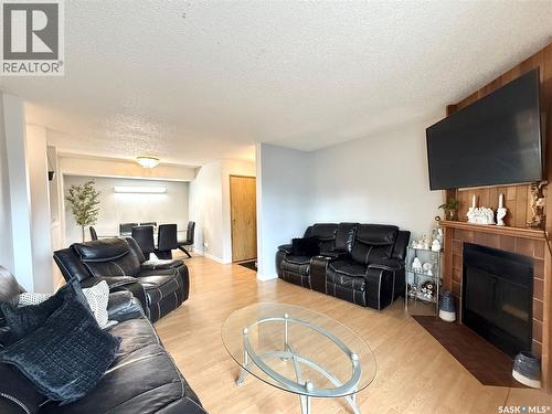 101 335 Kingsmere Boulevard, Saskatoon, SK - Indoor Photo Showing Living Room With Fireplace