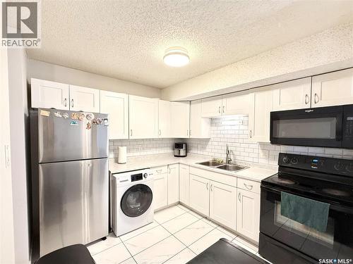 101 335 Kingsmere Boulevard, Saskatoon, SK - Indoor Photo Showing Kitchen With Double Sink