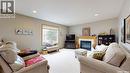 11172 Wascana Meadows, Regina, SK  - Indoor Photo Showing Living Room With Fireplace 