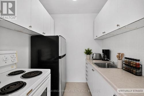 405 - 107 St Joseph'S Drive, Hamilton, ON - Indoor Photo Showing Kitchen