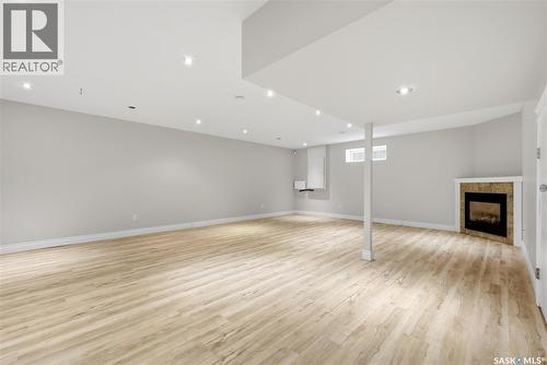 9382 Wascana Mews, Regina, SK - Indoor With Fireplace