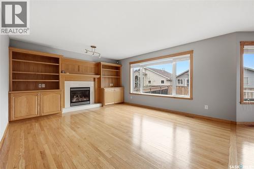 9382 Wascana Mews, Regina, SK - Indoor Photo Showing Living Room With Fireplace