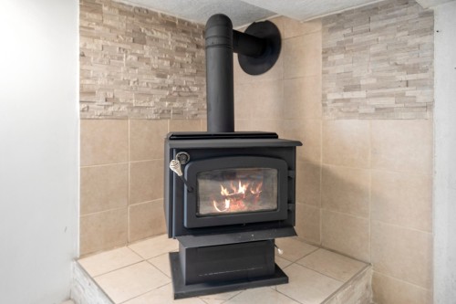 Sous-sol - 42 Rue Gaudreault, Repentigny (Repentigny), QC - Indoor With Fireplace