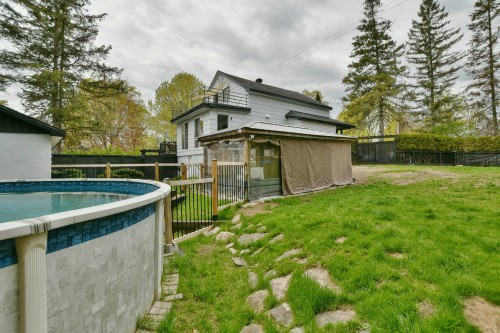 Cour - 574  - A Ch. Du Bois, Laval (Sainte-Dorothée), QC - Outdoor With Above Ground Pool