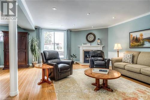 100 Biehn Drive, Kitchener, ON - Indoor Photo Showing Living Room With Fireplace