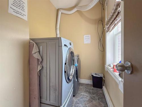221 Fourth Street, Reston, MB - Indoor Photo Showing Laundry Room