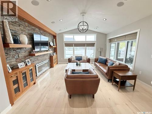 1832 Gordon Miles Place, Weyburn, SK - Indoor Photo Showing Living Room With Fireplace