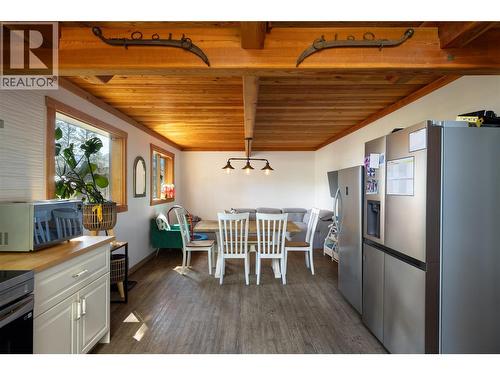 Kitchen looking toward dining area and family room - 4644 97 Highway, Westwold, BC - Indoor